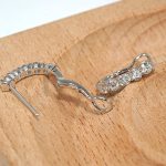 18K white gold diamond earrings, worn view