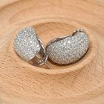 18K white gold diamond earrings, worn view 18K white gold diamond earrings, worn view