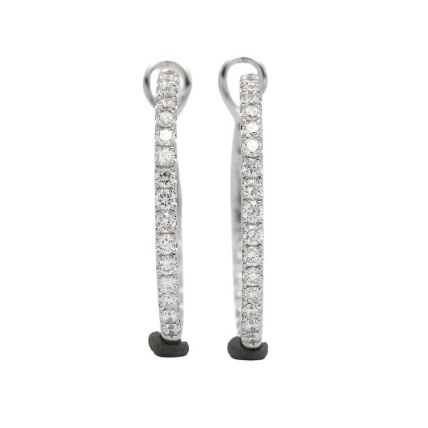 18K white gold diamond earrings, worn view