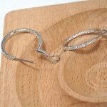 18K white gold diamond earrings, worn view 18K white gold diamond earrings, worn view